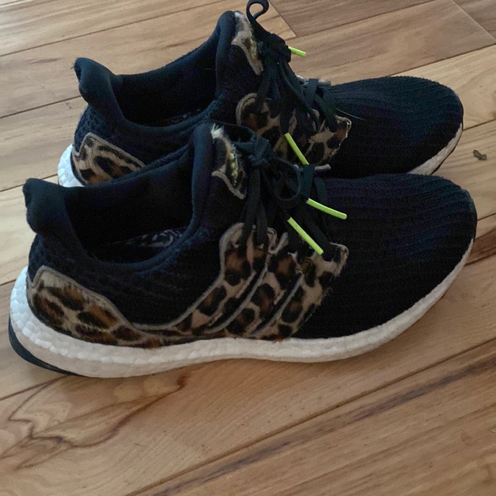 Gently used ASICS cheetah print ultra boost tennis shoes